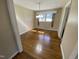 Classic dining area with hardwood floors and modern lighting fixture at 103 W Thorndale Dr, Oxford, NC 27565