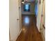 This home's entry leads to a living space showcasing hardwood floors, neutral walls and natural light at 103 W Thorndale Dr, Oxford, NC 27565