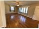 Bright living room with hardwood floors, complemented by natural light and neutral walls at 103 W Thorndale Dr, Oxford, NC 27565