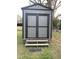 Outdoor shed with double doors and small steps for easy access at 103 W Thorndale Dr, Oxford, NC 27565