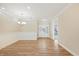 The living room features wood flooring and lots of natural light at 1067 Fairhaven Dr # 53, Mebane, NC 27302