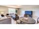 Cozy living room with comfortable seating, game table and TV at 1067 Fairhaven Dr # 53, Mebane, NC 27302