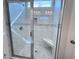 New shower featuring marble tile and a built-in shower seat at 1067 Fairhaven Dr # 53, Mebane, NC 27302