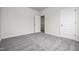 Cozy bedroom with plush carpet and a door leading to the closet at 111 E Victory View Ter, Smithfield, NC 27577