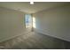 Bedroom featuring neutral carpet, a window for ample natural light, and electrical outlets at 12 Flatland Dr, Princeton, NC 27569