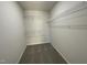 A walk-in closet with multiple wire shelves, providing ample storage space and organization at 12 Flatland Dr, Princeton, NC 27569