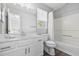 Bathroom with white cabinets, a shower and tub combination, and a granite countertop at 1204 Matthews Glen Dr, Knightdale, NC 27545