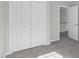 Bedroom featuring soft carpeting, neutral walls, and spacious closet at 1204 Matthews Glen Dr, Knightdale, NC 27545