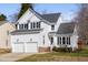 Beautiful two-story home featuring a two-car garage and a well-maintained lawn at 1204 Matthews Glen Dr, Knightdale, NC 27545