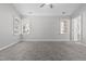 Spacious main bedroom with soft carpet, neutral walls, and bright windows for natural light at 1204 Matthews Glen Dr, Knightdale, NC 27545