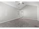 Neutral toned main bedroom with plush carpeting and adjacent ensuite bathroom at 1204 Matthews Glen Dr, Knightdale, NC 27545