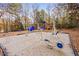 Community outdoor gym and playground equipment on mulch and concrete at 1204 Matthews Glen Dr, Knightdale, NC 27545