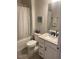 Bright bathroom with a shower-tub combo and vanity at 1216 Blue Mist Ct, Apex, NC 27502