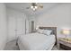 Bright bedroom featuring a bed, a ceiling fan, and two closets at 123 Liam St, Clayton, NC 27520