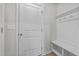 Hallway features built-in coat rack and bench seating, as well as entry to the home at 123 Liam St, Clayton, NC 27520
