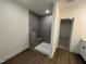 A bathroom with a custom tiled shower and bench seating at 124 Willow Cameron Way, Angier, NC 27501