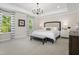 Bright bedroom with trey ceilings, large windows, and neutral decor for a serene retreat at 124 Willow Cameron Way, Angier, NC 27501