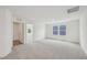 Upstairs bonus room featuring soft carpeting, recessed lighting, and bright, natural light at 124 Willow Cameron Way, Angier, NC 27501