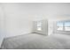 Spacious bonus room with soft carpeting, recessed lights, and great natural light at 124 Willow Cameron Way, Angier, NC 27501