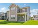 Exterior showcasing the backyard and covered patio at 124 Willow Cameron Way, Angier, NC 27501