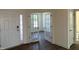 View of the front door and a set of glass French doors off of the foyer at 124 Willow Cameron Way, Angier, NC 27501