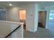 A hallway with a half bath featuring a vanity and sink at 124 Willow Cameron Way, Angier, NC 27501