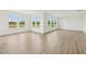 Spacious living room featuring bright, natural light and pristine hardwood flooring at 124 Willow Cameron Way, Angier, NC 27501