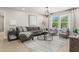Comfortable living room with modern furniture, ample seating, and stylish decor at 124 Willow Cameron Way, Angier, NC 27501