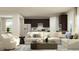 Spacious living room showcasing a sectional sofa, modern coffee table, and an open view of the kitchen at 1248 Hazelnut Ridge Ln, Knightdale, NC 27545