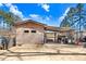 Exterior shot of outbuilding with double doors and adjacent covered lean-to at 12808 Old Stage Rd, Willow Springs, NC 27592