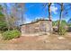 Exterior shot of outbuilding with double doors at 12808 Old Stage Rd, Willow Springs, NC 27592