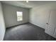 Room with carpet flooring and natural light from a window at 1308 Hazelnut Ridge Ln, Knightdale, NC 27545