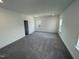 Spacious bedroom featuring neutral walls, carpet and windows at 1308 Hazelnut Ridge Ln, Knightdale, NC 27545