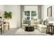 Inviting living room with a large sofa, natural lighting, and stylish decor at 1308 Hazelnut Ridge Ln, Knightdale, NC 27545