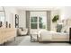 Serene bedroom featuring natural light, stylish furnishings, and a soothing neutral color palette at 1308 Hazelnut Ridge Ln, Knightdale, NC 27545