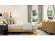 Charming bedroom featuring stylish furniture, natural light, and a cozy atmosphere, creating a relaxing retreat at 1308 Hazelnut Ridge Ln, Knightdale, NC 27545