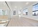Bright office space with hardwood floors, large windows, and plenty of natural light at 1308 Hazelnut Ridge Ln, Knightdale, NC 27545