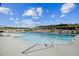 Community pool with lounge chairs and shade at 1308 Hazelnut Ridge Ln, Knightdale, NC 27545