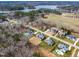Aerial view of luxury homes in a lakeside community at 149 Bonica Creek Dr, Garner, NC 27529