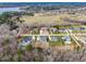 Aerial view of luxury homes in a lakeside community at 149 Bonica Creek Dr, Garner, NC 27529