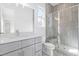 Modern bathroom featuring a glass-enclosed shower with a built-in bench and a vanity with drawers at 149 Bonica Creek Dr, Garner, NC 27529