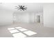 Spacious bonus room features a modern ceiling fan, neutral carpet, and plenty of natural light at 149 Bonica Creek Dr, Garner, NC 27529