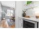 Open concept, view into dining room featuring a table, six chairs, a plant in a white vase, and a chandelier at 149 Bonica Creek Dr, Garner, NC 27529