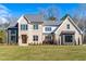Beautiful two-story brick home with a manicured lawn and a classic architectural design at 149 Bonica Creek Dr, Garner, NC 27529