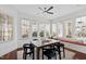 Eat-in kitchen area with modern lighting, view from large windows, and breakfast nook seating at 1530 The Preserve Trail, Chapel Hill, NC 27517