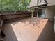 A freshly painted, secluded wooden back deck with direct access to the main house at 159 Finley Forest Dr, Chapel Hill, NC 27517