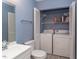 Comfortable bathroom with a washing machine, sink, mirror and toilet at 159 Finley Forest Dr, Chapel Hill, NC 27517