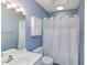 Well-lit bathroom with a shower-tub, white vanity, and medicine cabinet at 159 Finley Forest Dr, Chapel Hill, NC 27517