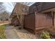 Charming two-story brick condo with a cozy front porch and landscaped surroundings at 159 Finley Forest Dr, Chapel Hill, NC 27517
