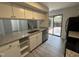 The kitchen features granite counters, stainless appliances, and access to the back deck at 159 Finley Forest Dr, Chapel Hill, NC 27517